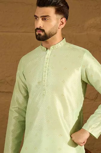 Men green silk blend solid woven design straight kurta with trouser