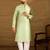 Men green silk blend solid woven design straight kurta with trouser