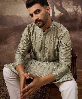 Men green silk blend solid embroidered straight kurta with pant set 1