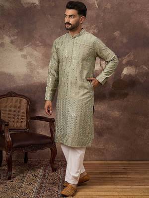 Men green silk blend solid embroidered straight kurta with pant set 4
