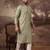 Men green silk blend solid embroidered straight kurta with pant set