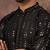 Men black silk blend solid embroidered straight kurta with pant set