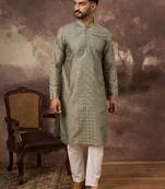 Men green silk blend solid embroidered straight kurta with trouser