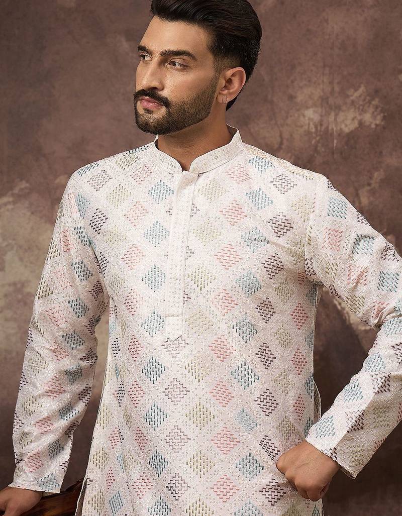 Men white silk blend solid embroidered straight kurta with pant set