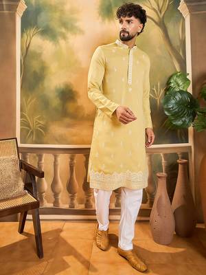 Men yellow silk blend solid embroidered straight kurta with trouser 3