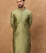 Men green silk blend solid woven design straight kurta with pant set