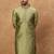 Men green silk blend solid woven design straight kurta with pant set