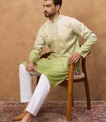 Men green silk blend solid embroidered straight kurta with pant set
