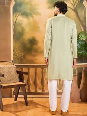 Men green silk blend solid embroidered straight kurta with trouser 5