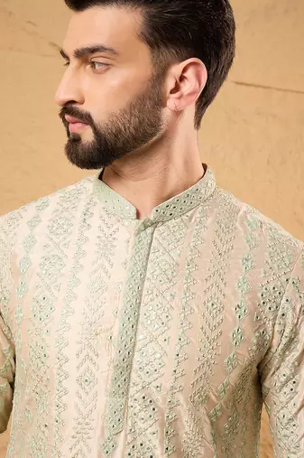 Men off white silk blend solid embroidered straight kurta with trouser