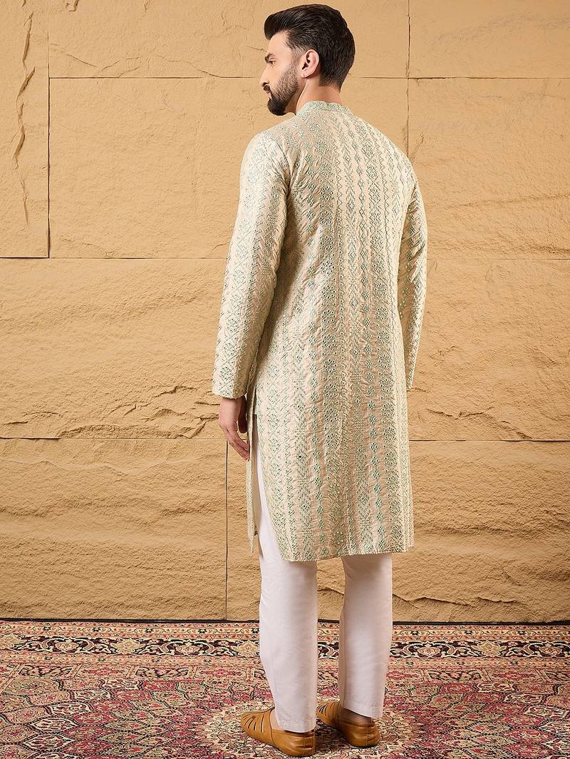 Men off white silk blend solid embroidered straight kurta with trouser