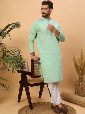 Men blue silk blend solid embroidered straight kurta with pant set 4