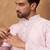 Men pink silk blend solid embroidered straight kurta with pant set