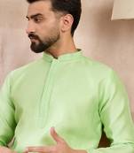 Men green silk blend solid embroidered straight kurta with trouser