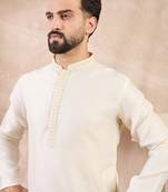 Men off white silk blend solid embroidered straight kurta with trouser