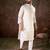 Men white silk blend floral embroidered straight kurta with trouser