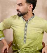 Men green silk blend ethnic motifs embroidered straight kurta with trouser