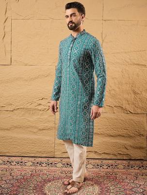 Men blue silk blend solid embroidered straight kurta 4