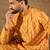Men yellow silk blend ikat printed straight kurta