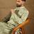 Men olive silk blend ethnic motifs embroidered straight kurta