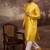 Men yellow silk blend solid woven design straight kurta