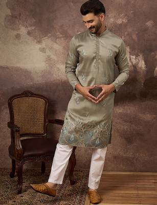 Men green silk blend solid embroidered straight kurta 1