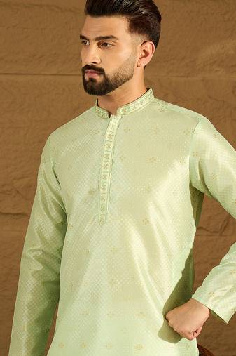 Men green silk blend solid woven design straight kurta