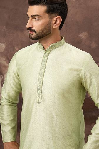 Men green silk blend solid woven design straight kurta