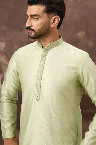 Men green silk blend solid woven design straight kurta