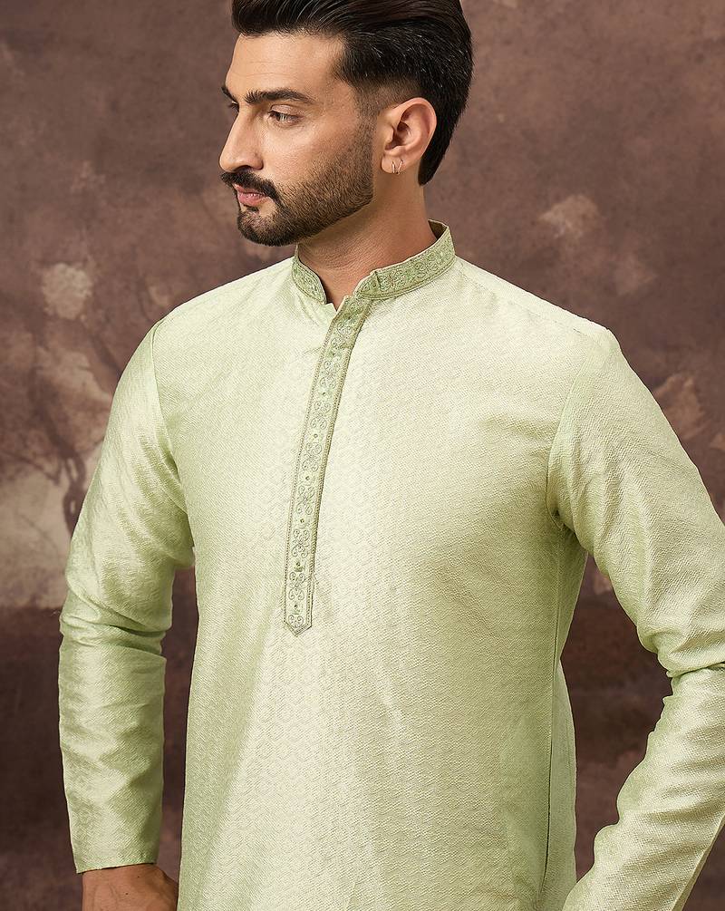 Men green silk blend solid woven design straight kurta