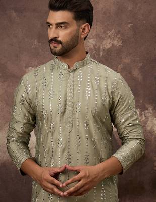 Men green silk blend solid embroidered straight kurta 1