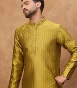 Men yellow silk blend solid woven design straight kurta