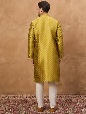 Men yellow silk blend solid woven design straight kurta 4