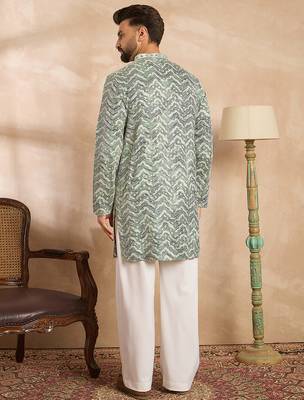 Men green silk blend solid embroidered straight kurta 4