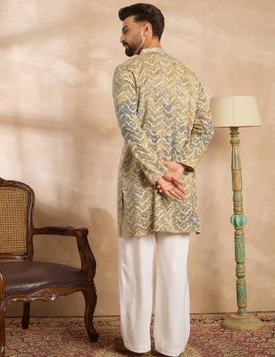 Men green silk blend solid embroidered straight kurta 4