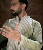 Men green silk blend solid embroidered straight kurta