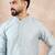 Men blue silk blend solid woven design straight kurta