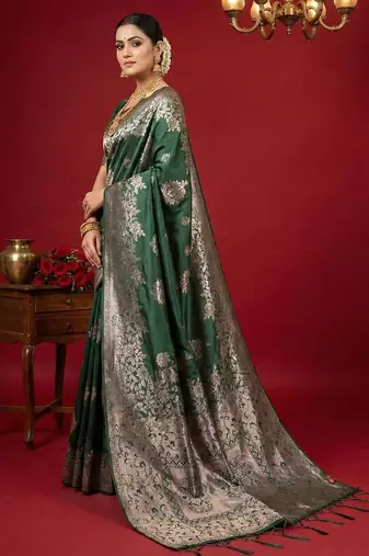 Dark green color woven work silk blend saree with blouse