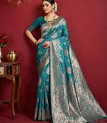 Sea green color woven work silk blend saree with blouse