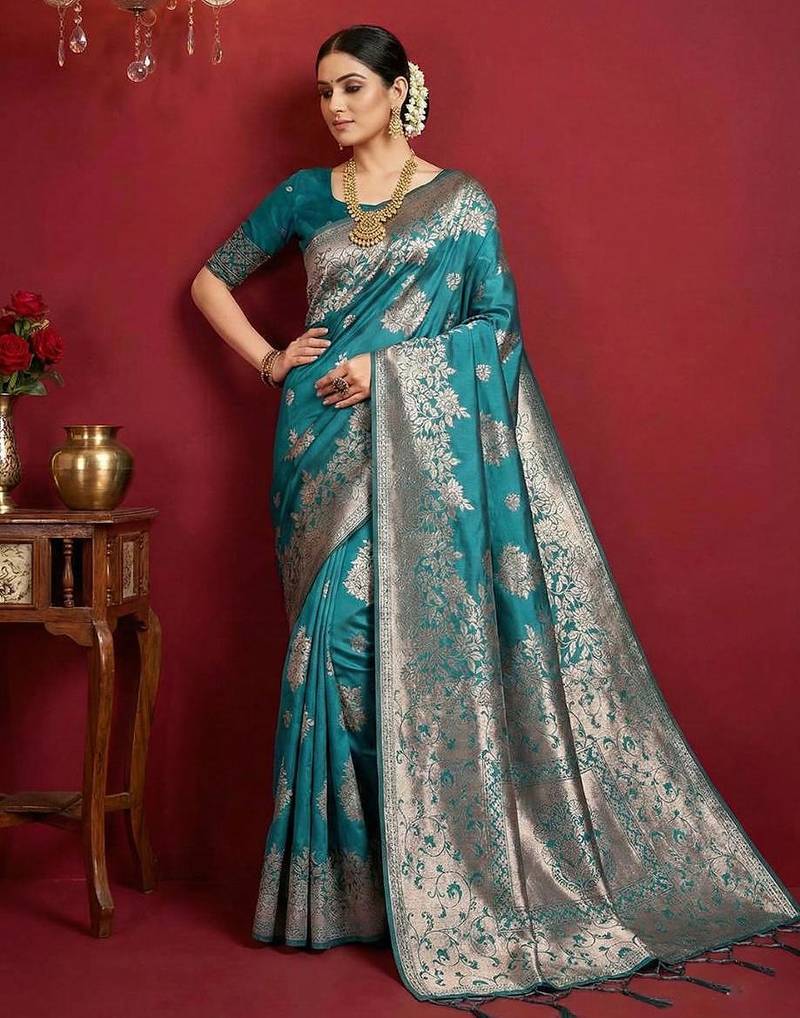Sea green color woven work silk blend saree with blouse