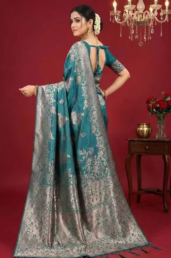 Sea green color woven work silk blend saree with blouse