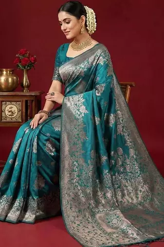 Sea green color woven work silk blend saree with blouse