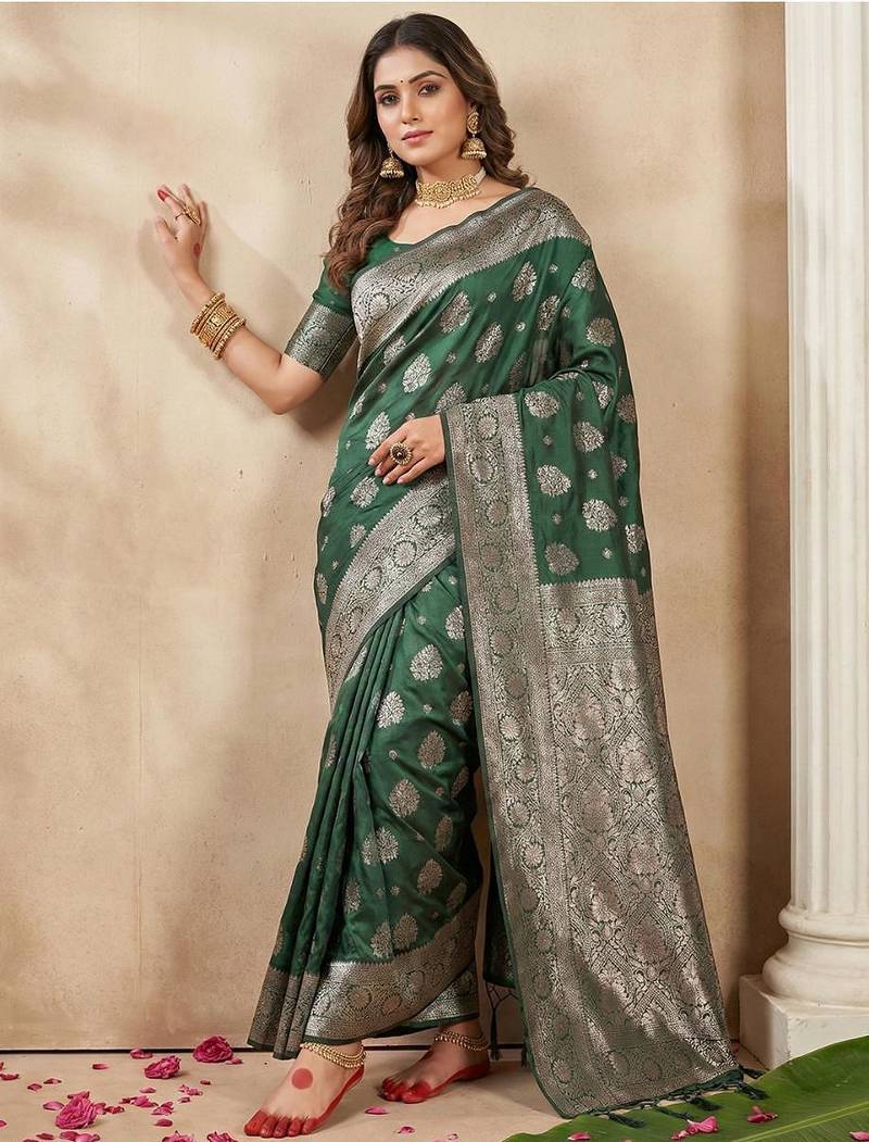 Dark green color woven work silk blend saree with blouse