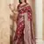Maroon color woven work silk blend saree with blouse