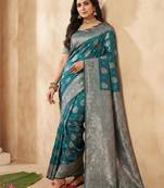 Sea green color woven work silk blend saree with blouse