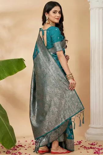 Sea green color woven work silk blend saree with blouse