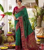Green color woven work soft silk party wear saree with blouse