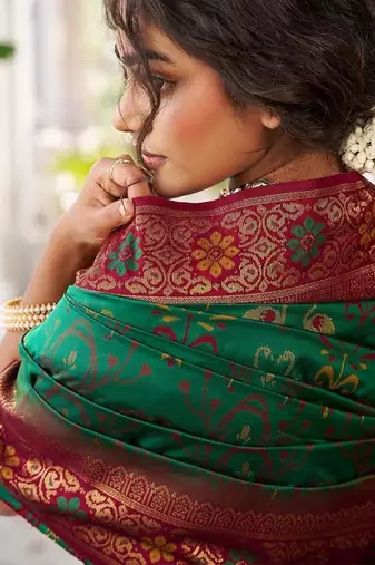 Green color woven work soft silk blend party wear saree with blouse