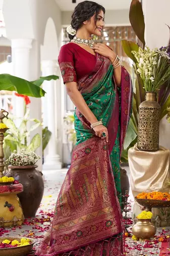 Green color woven work soft silk blend party wear saree with blouse