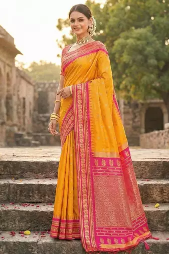 Yellow color woven work soft silk blend party wear saree with blouse